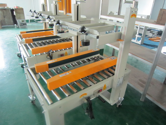 膠帶封箱機(jī)的工作原理是什么？